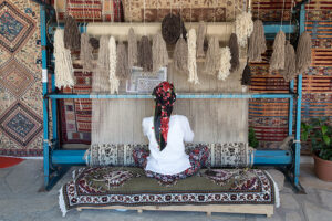 Female rug artist